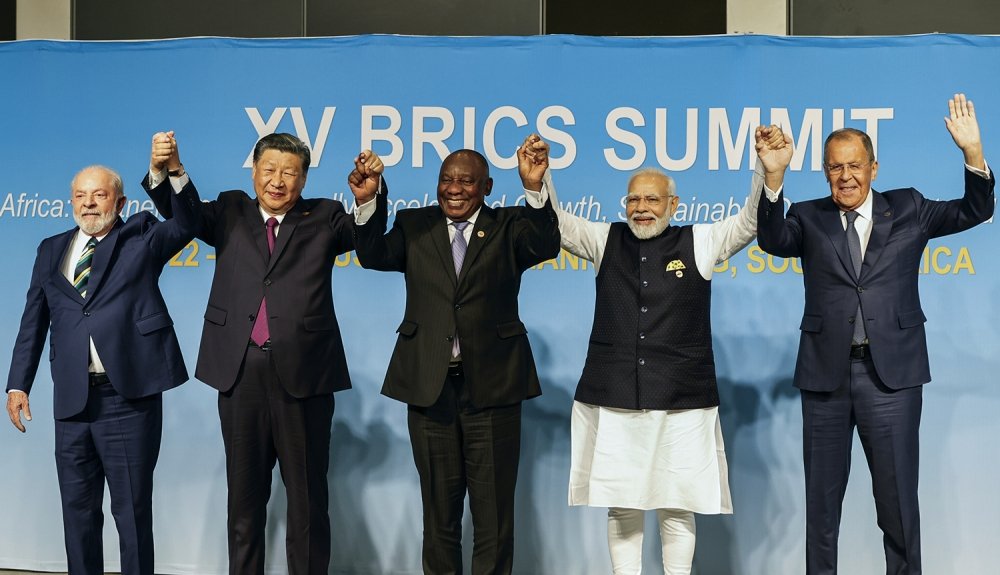  From left, Brazil's President Luiz Inacio Lula da Silva, China's President Xi Jinping, South Africa's President Cyril Ramaphosa, India's Prime Minister Narendra Modi and Russia's Foreign Minister Sergei Lavrov pose for a BRICS group photo during the 2023 BRICS Summit at the Sandton Convention Center in Johannesburg, South Africa, Wednesday, August 23, 2023. (Gianluigi Guercia/Pool via AP)