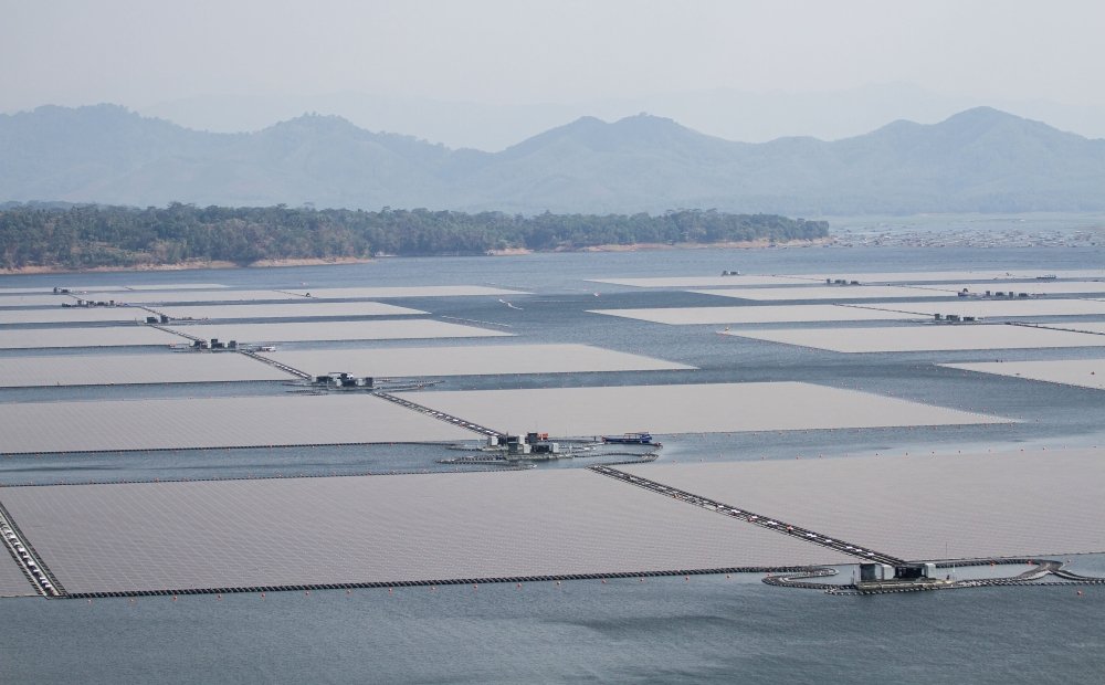 Aerial view of Floating solar panels or solar cell Platform system on the lake at Waduk Cirata