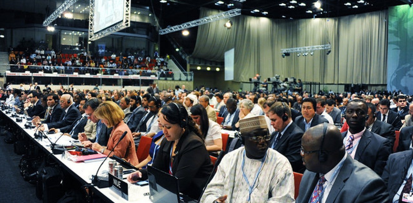 Delegates gather in South Africa for a UN climate summit in 2011. Photo by UN Photo/UNFCCC/Jan Golinski, via Flickr. Creative Commons.