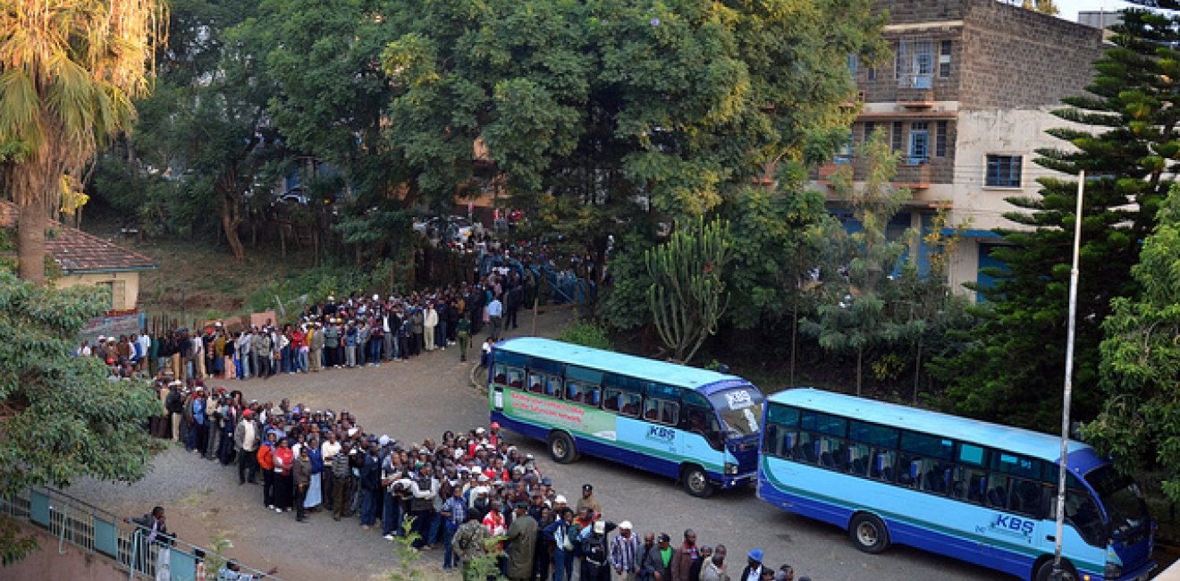 Citizens line up to vote in the 2013 Kenyan elections. Photo by Commonwealth Secretariat, via Flickr. Creative Commons.