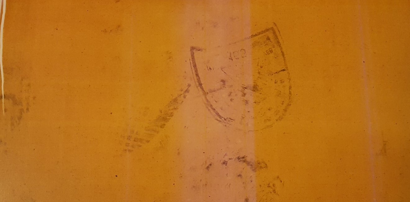 A footprint is visible on the back of one of the documents taken during the 1953 uprising.