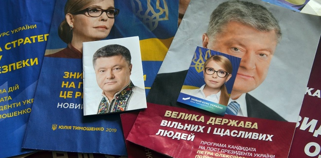 Election campaign leaflet with images of Yulia Tymoshenko and Petro Poroshenko.