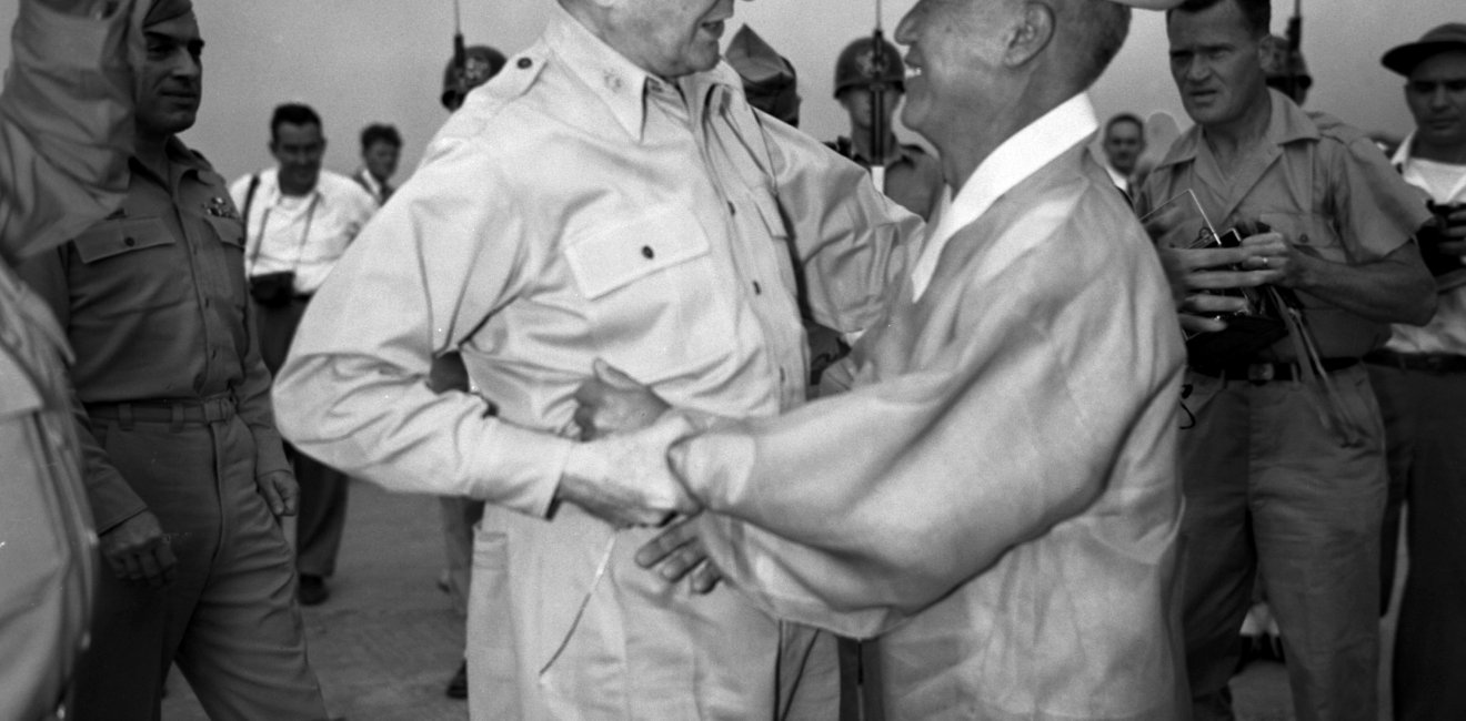 Syngman Rhee (left) greets US General Douglas MacArthur at Kimpo Air Force Base.