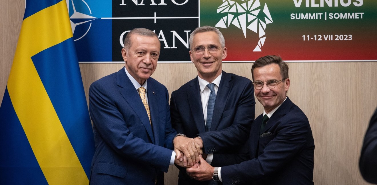 President Recep Tayyip Erdoǧan of Türkiye, Prime Minister Ulf Kristersson of Sweden, and NATO Secretary General Jens Stoltenberg after reaching an agreement ahead of NATO Summit in Vilnius, July 2023