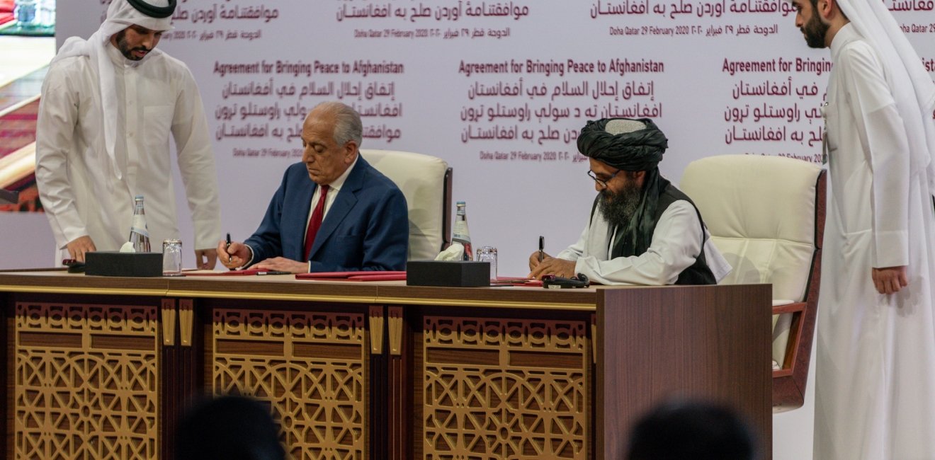 U.S. Special Representative for Afghanistan Reconciliation Ambassador Zalmay Khalilzad participates in a signing ceremony in Doha, Qatar. (DoS photo)