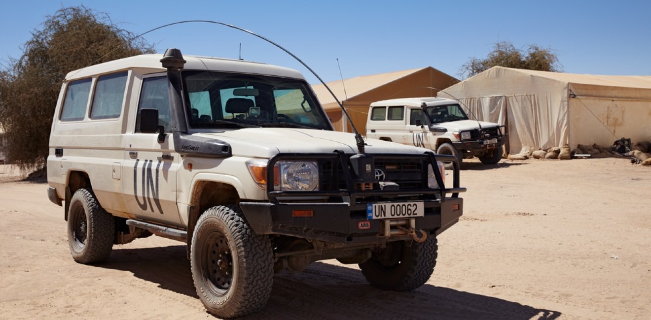 Armored patrol vehicles parked in Burkina Faso UN military base in Timbuktu region at United Nation peacekeeping mission in Mali