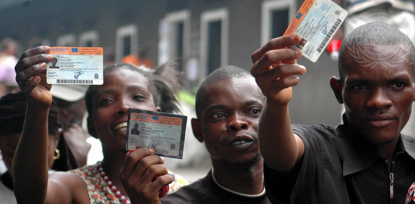 Congolese with their voting cards