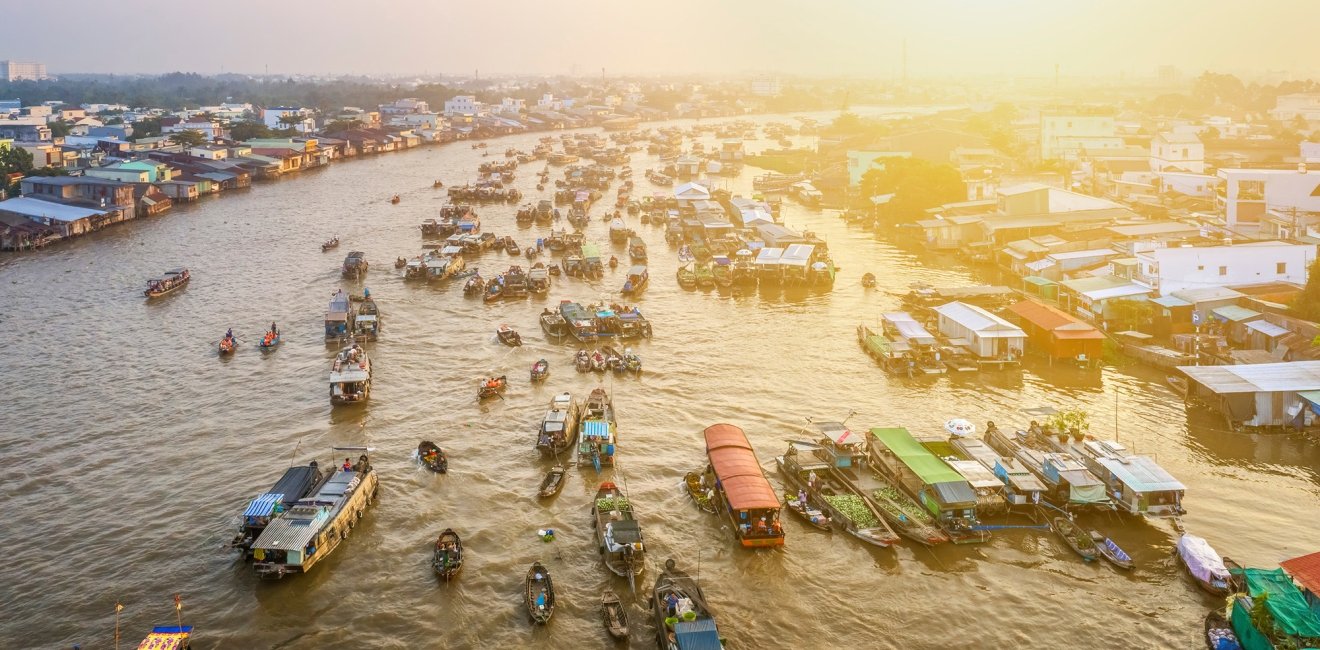 Boats forming a floating market on the Mekong River.