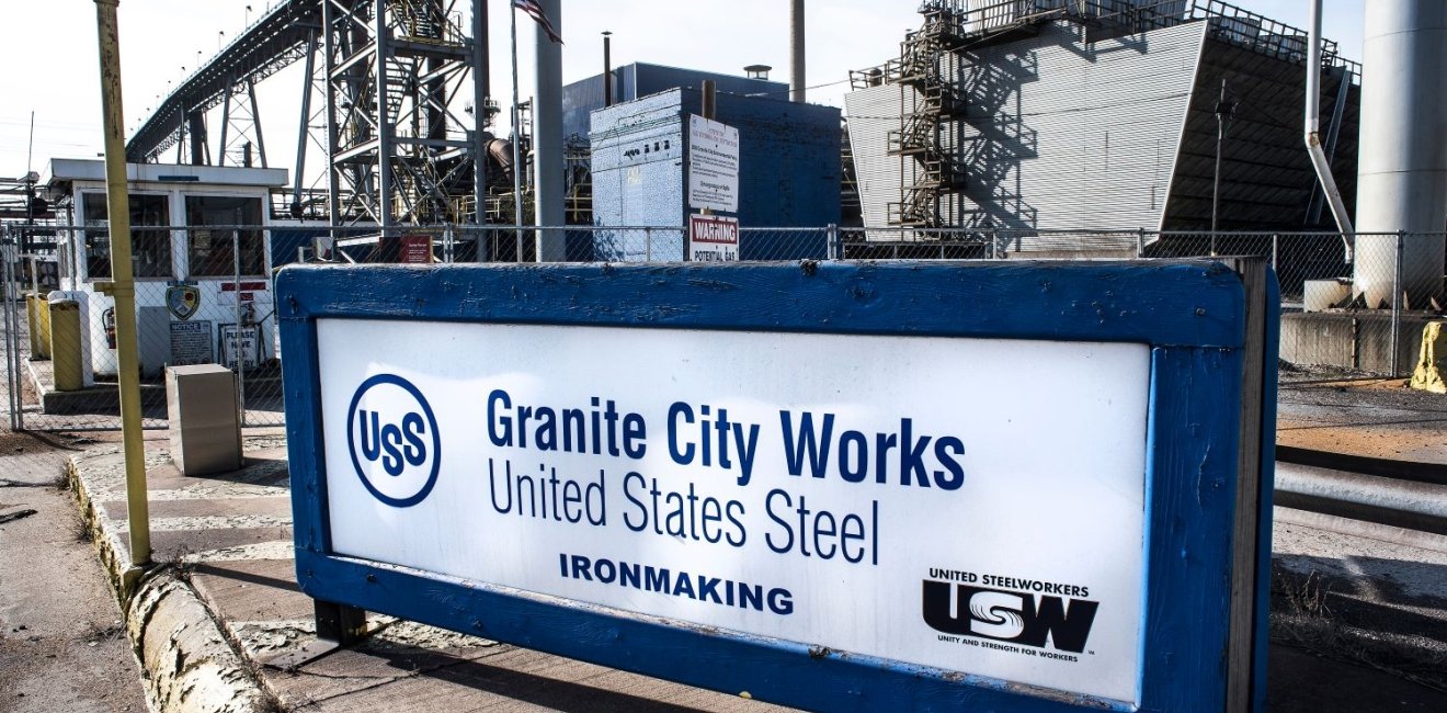 A manufacturing plant in the background with a sign that says Granite City Works United States Steel