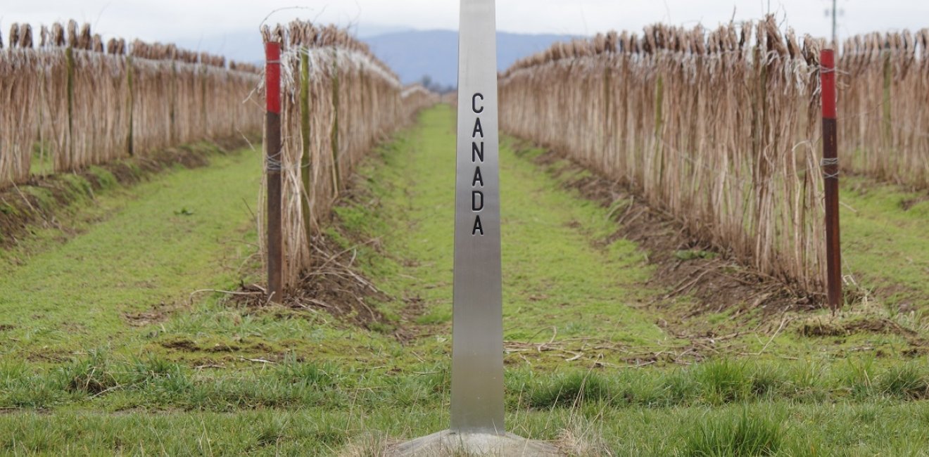 Canadian Border Marker stands on the 49th parallel/Canadian Border Marker/Canadian Border Marker divides Canada and the United States