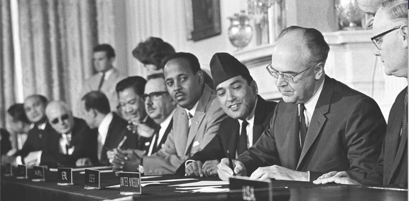 Soviet ambassador Anatoli Dobrynin signs the NPT in 1968