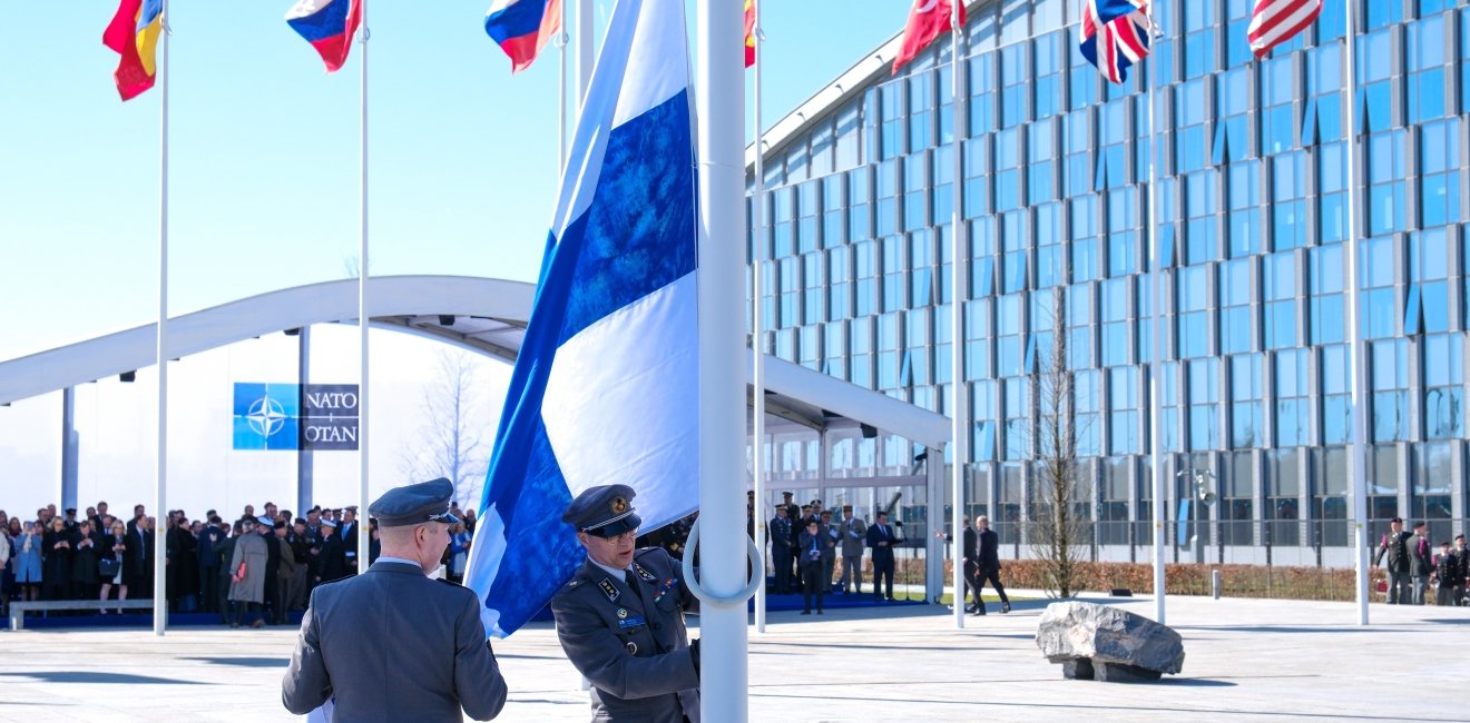 Finland installing Finnish flag at NATO