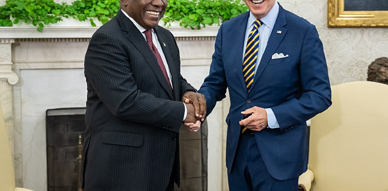 President Joe Biden and South African President Cyril Ramaphosa shake hands in the Oval Office