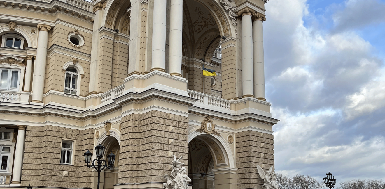 Building in Ukraine flying a Ukrainian flag