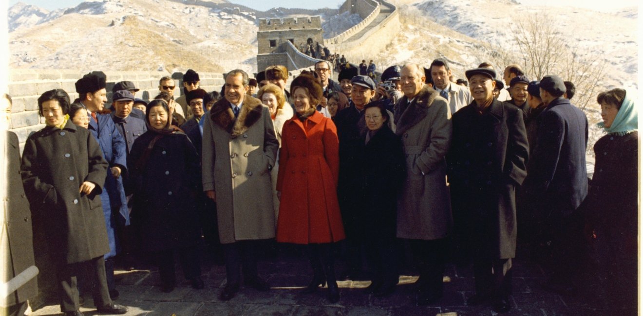 President Richard Nixon, Pat Nixon, William Rogers, Chinese officials, Pat Buchanan, White House Press Office photographer Oliver Atkins, Ron Walker, and entourage at the Ba Da Ling portion of the Great Wall.