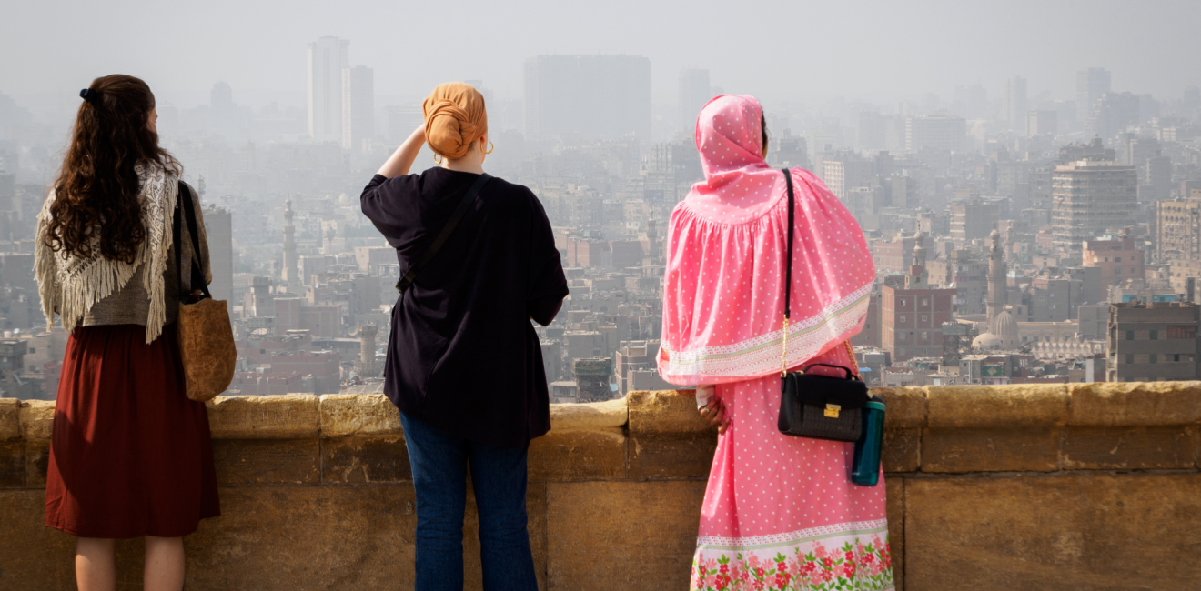 Cairo, Egypt, February 2020 three women overlooking the skyline of cairo