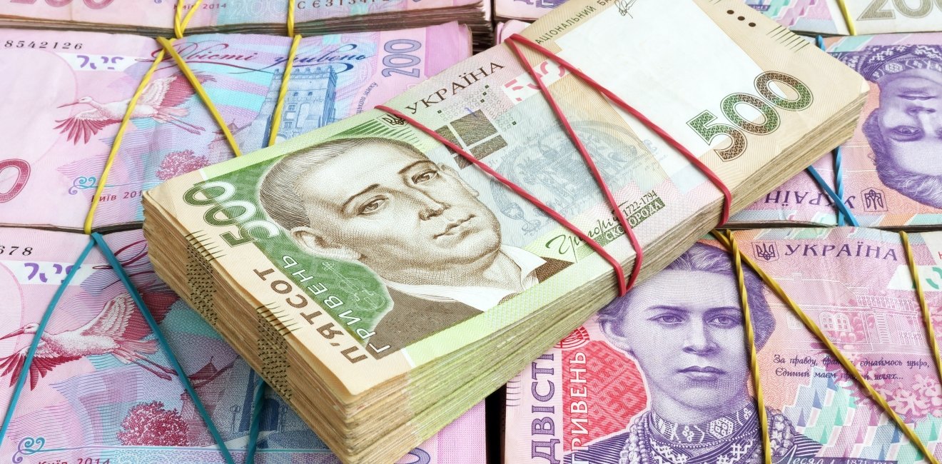 Image: Stacks of Ukrainian hryvnia UAH banknotes.