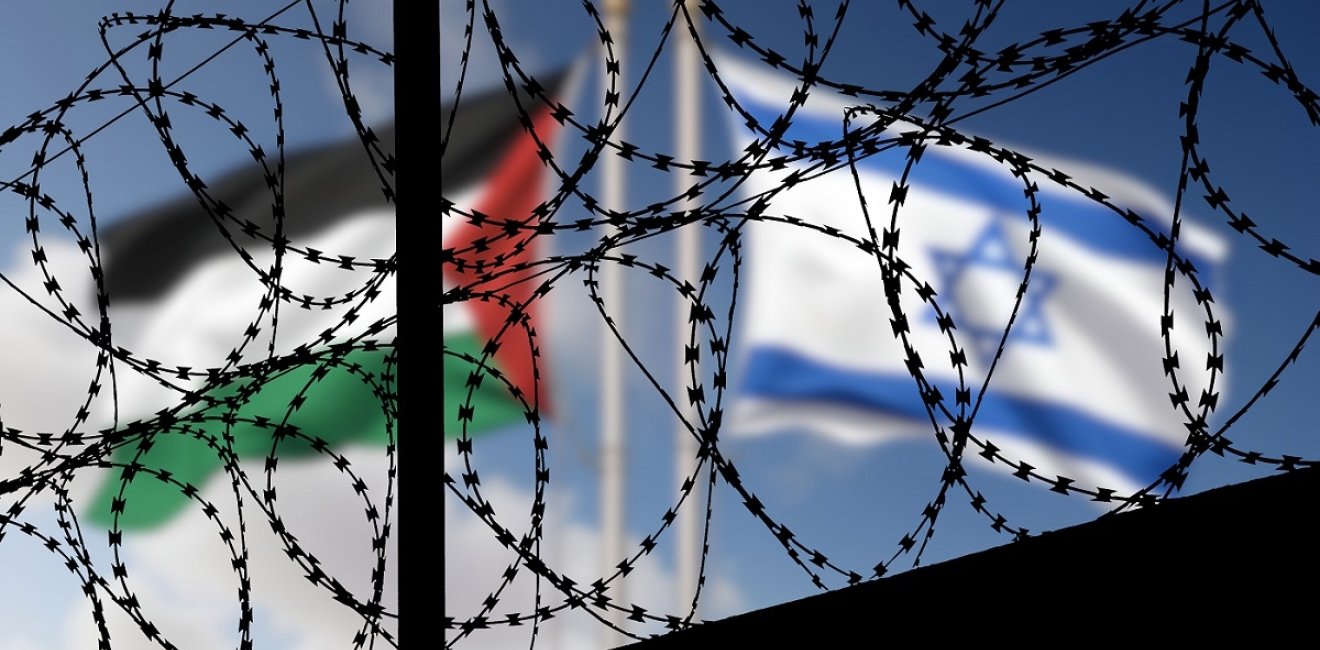 Flags of Israel and Palestine and barbed wire