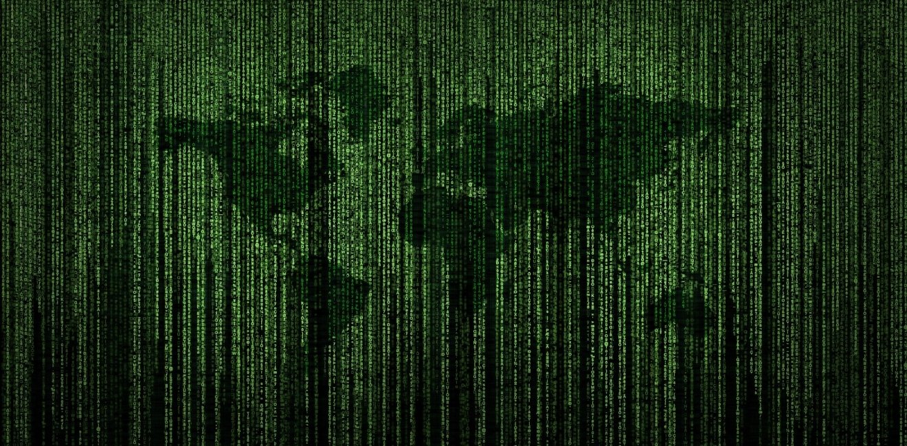 Green world map with binary code