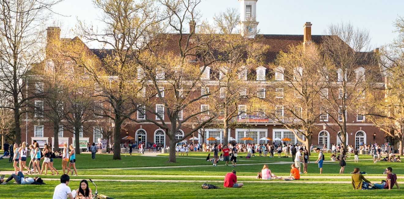  Students mingle on Quad lawn of University of Illinois college campus in Urbana Champaign