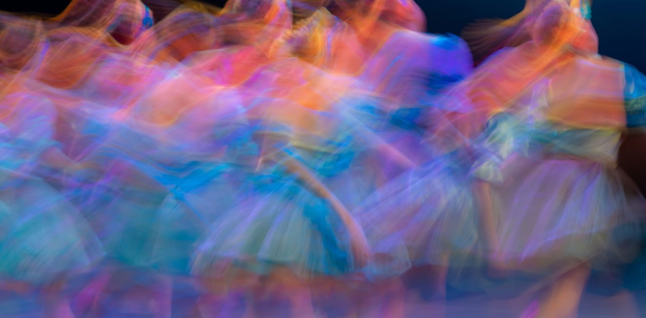 Long exposure photo of ballet dancers moving