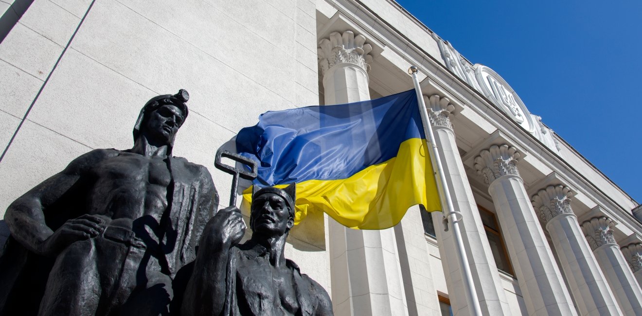 lag in front of the facade of the building of the Verkhovna Rada of Ukraine, June 2019