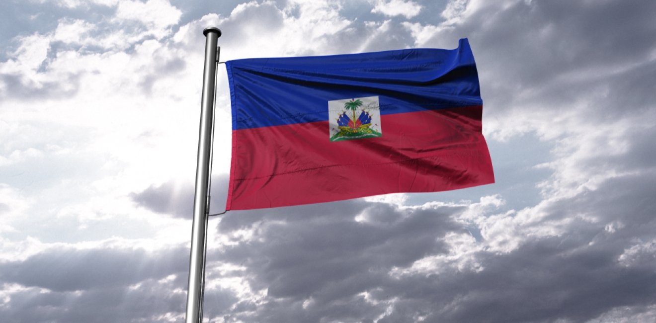 Haitian Flag Over Cloudy Sky