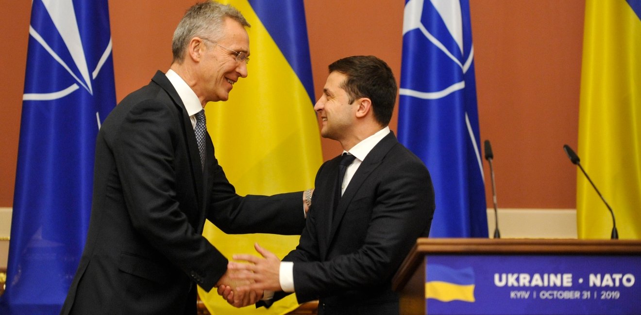 KYIV, UKRAINE- October 31, 2019: NATO Secretary General Jens Stoltenberg speaks to Ukrainian President Volodymyr Zelensky after the Ukraine-NATO Commission meeting