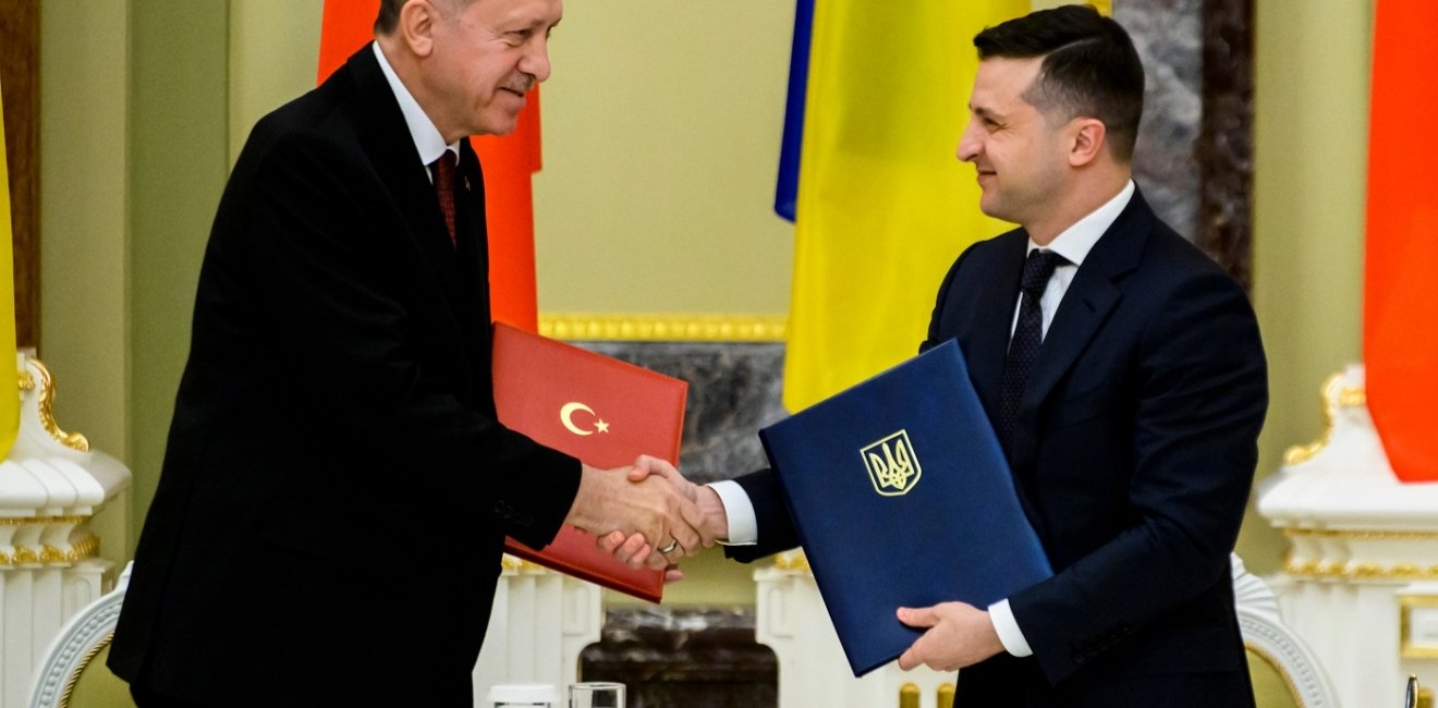 Turkish President Recep Erdogan and Ukrainian President Volodymyr Zelensky shake hands in Kiev, Ukraine February 3, 2020