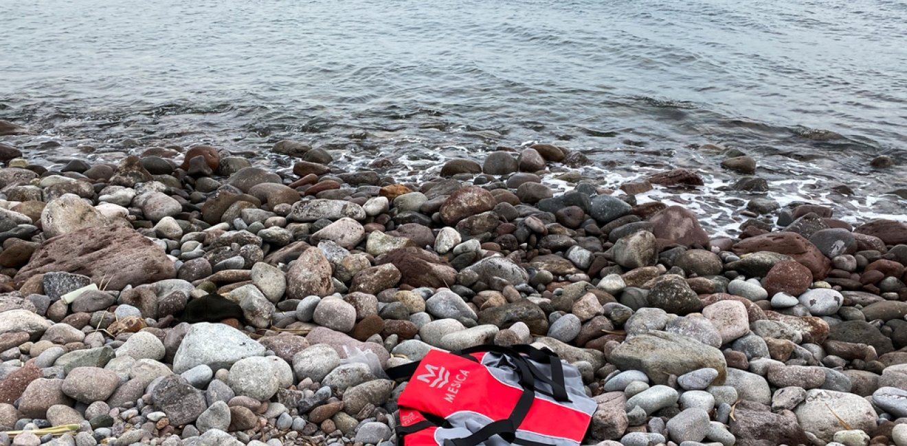 Lifejacket on rocky coast