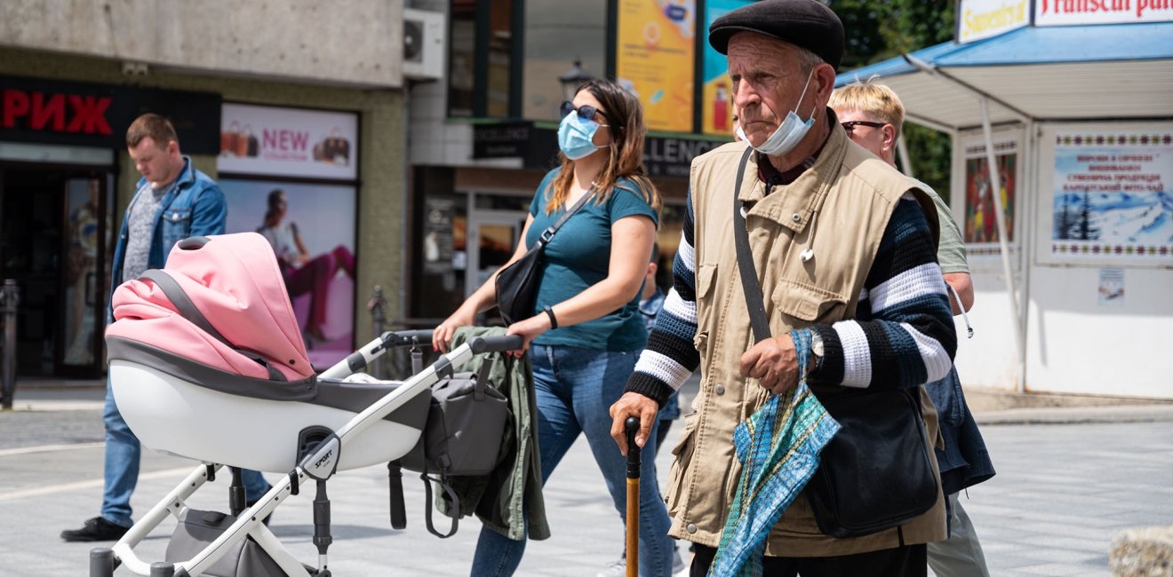 Quarantine in the city of Uzhhorod due to the COVID-19 virus. People in protective masks in the streets of the city