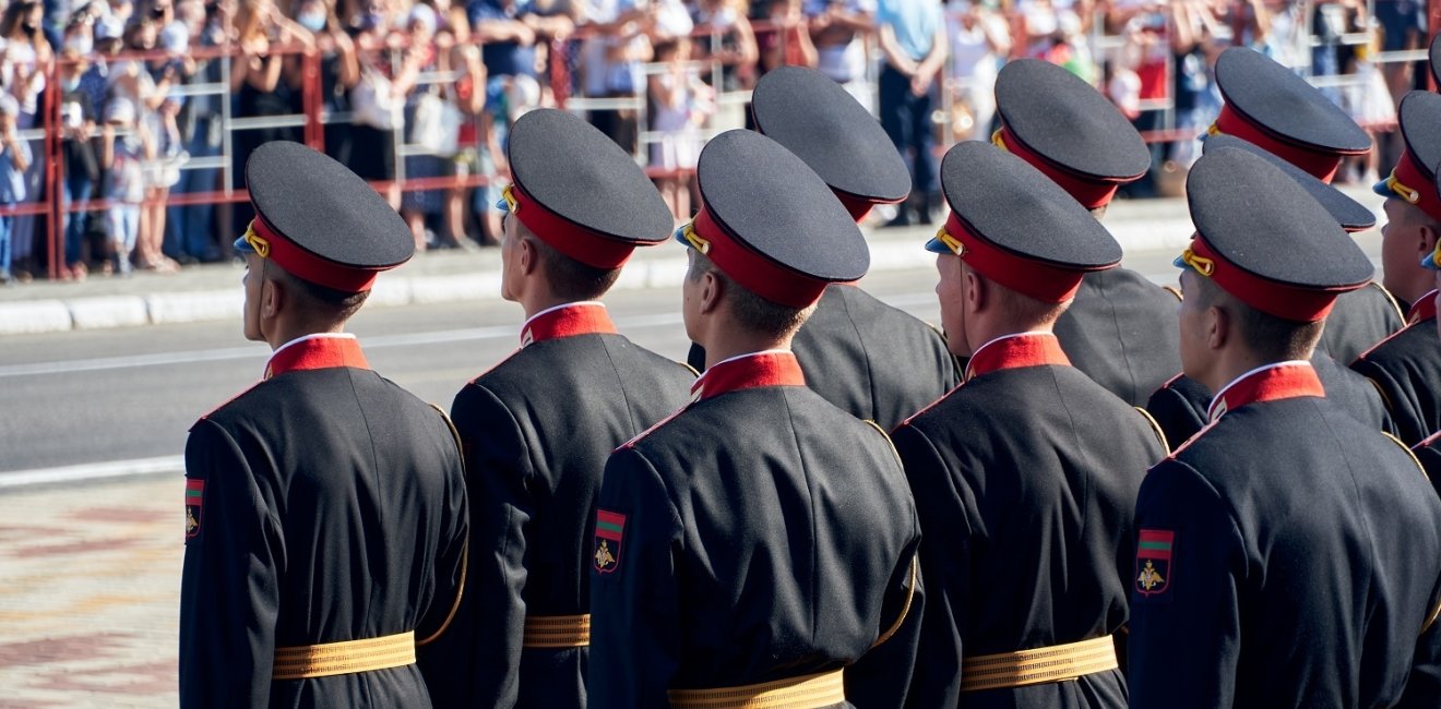 Tiraspol, Transnistria - September 2, 2020: military parade dedicated to the 30th anniversary of independence, soldiers in full dress uniforms, Russian text on Chevron - armed forces of Transnistria