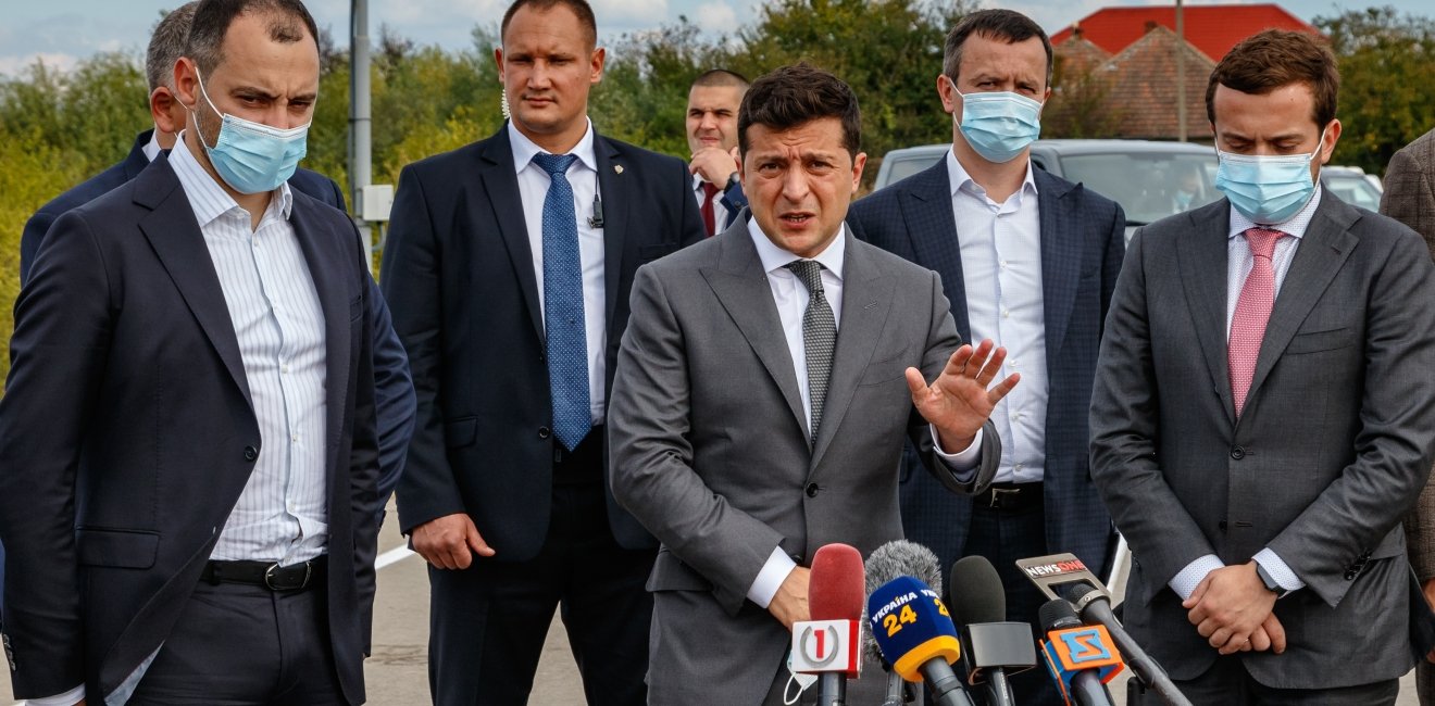  September 25, 2020: President of Ukraine Volodymyr Zelensky (С) answers questions of journalists after inspecting M24 highway as part of working visit to the Zakarpattia region.