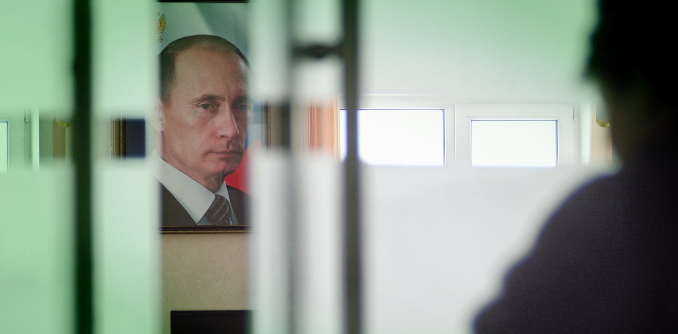 Moscow, Russia-September 24, 2019.A portrait of Vladimir Putin, the President of Russia, hangs on the wall in the room