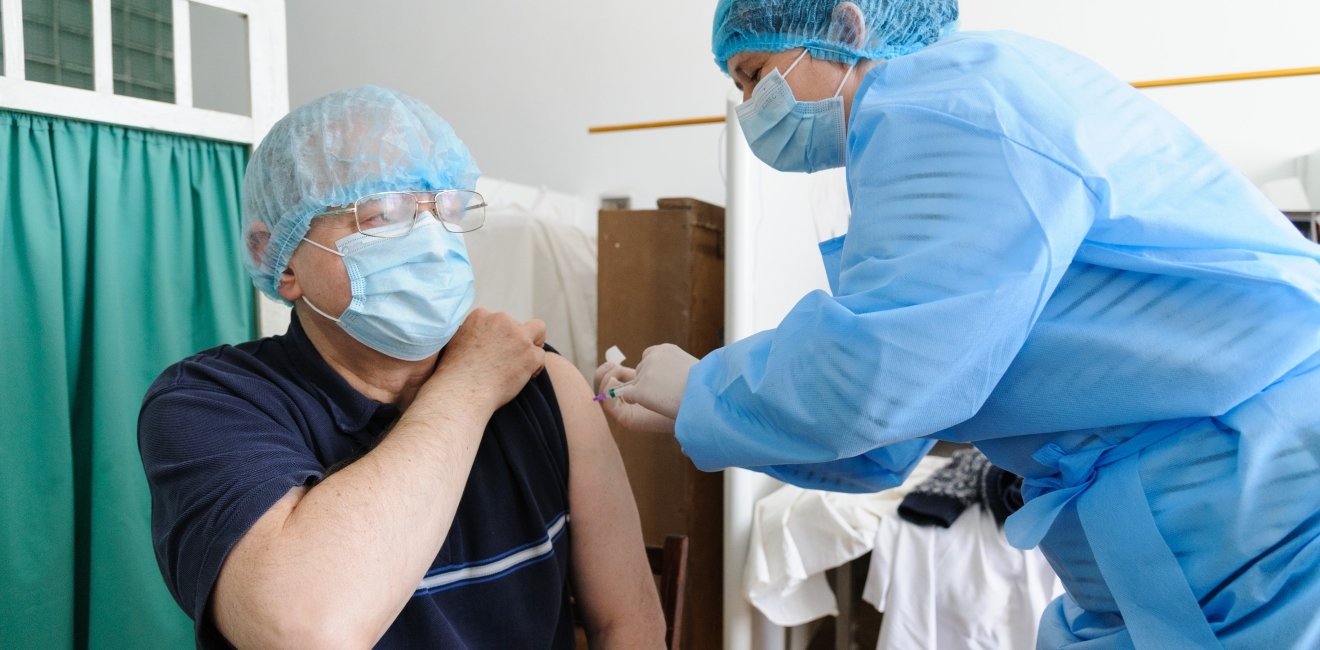 18 march 2021. Lviv, Ukraine. A health worker gets a shot of the AstraZeneca (Covishield) vaccine at the hospital. The Ministry of Health of Ukraine has publicly vaccinated health workers first