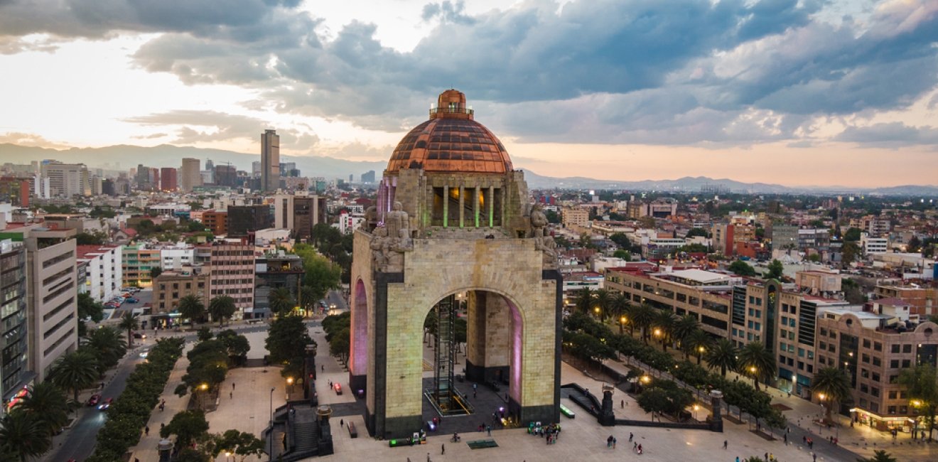 Aerial view of city centre including historical landmark Monument to the Revolution located at Plaza de La Republica in Mexico City, Mexico.