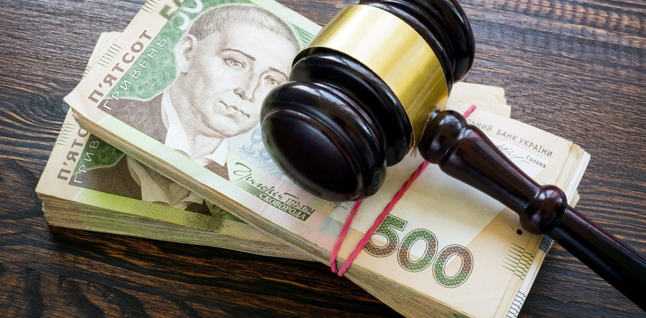 Ukrainian hryvnia money and a gavel