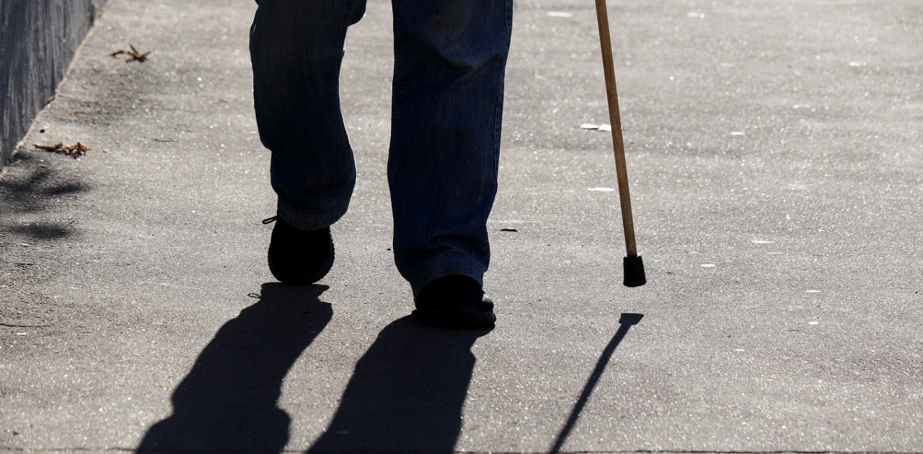 Man walking with a cane