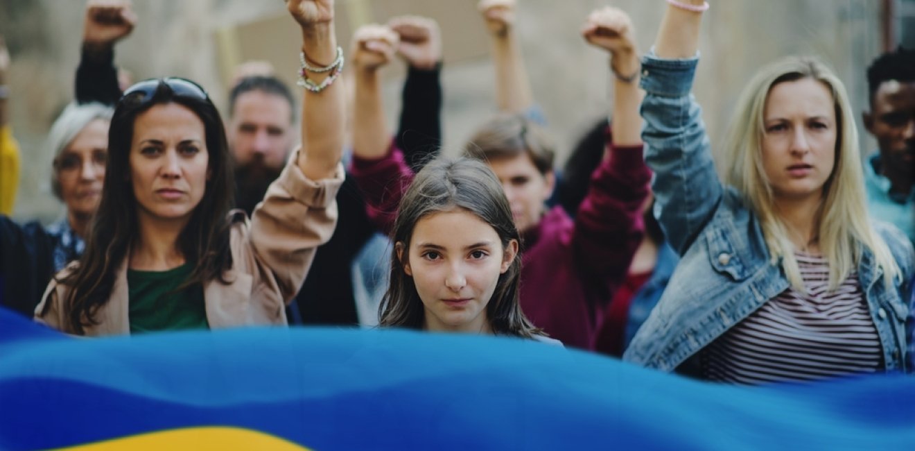 men with Ukrainian Flag