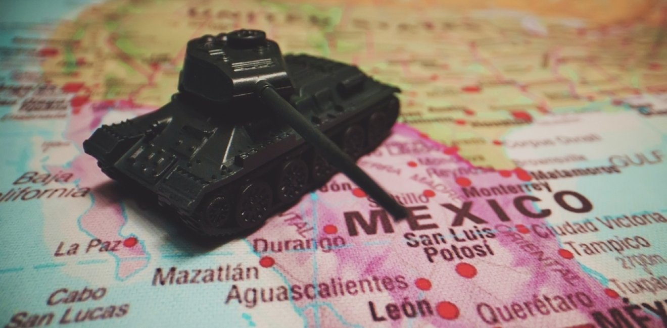 Toy tanks on the map. War on drug cartels in Mexico.