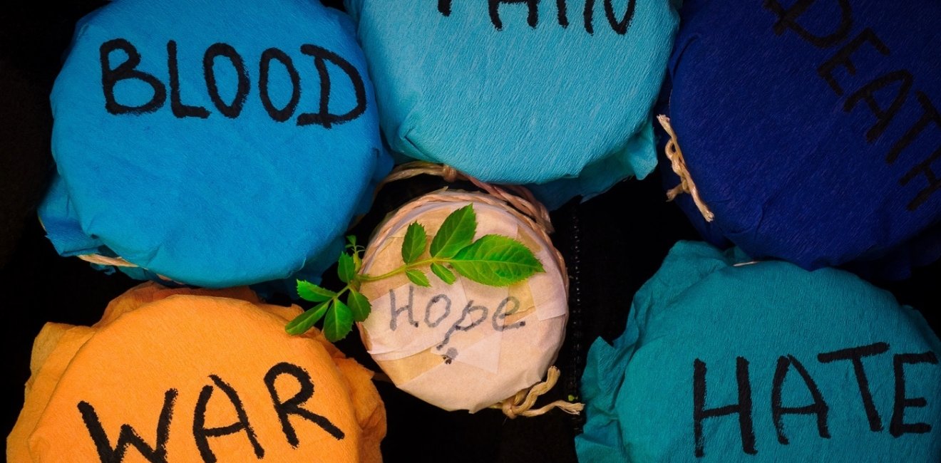 Jars with labels "War," "Blood," "Pain," "Hate," "Hope"