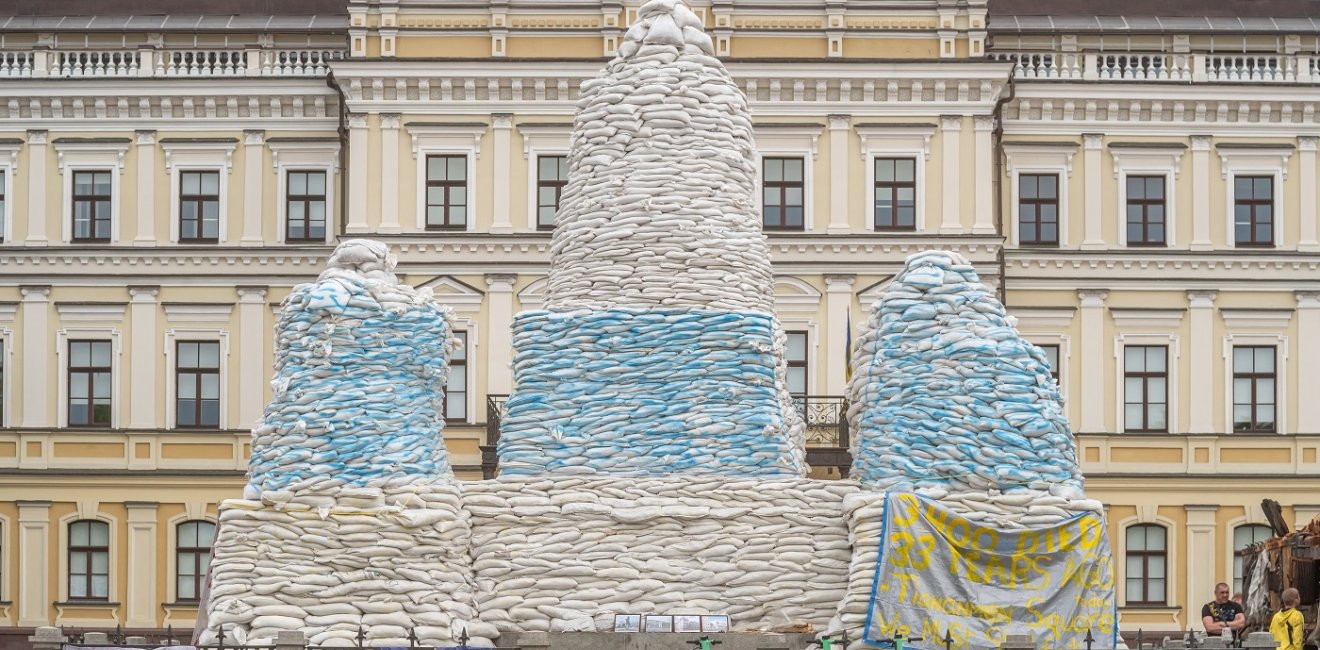 Kyiv, Ukraine - June 5 2022. Monument to Princess Olga barricaded with sandbags.