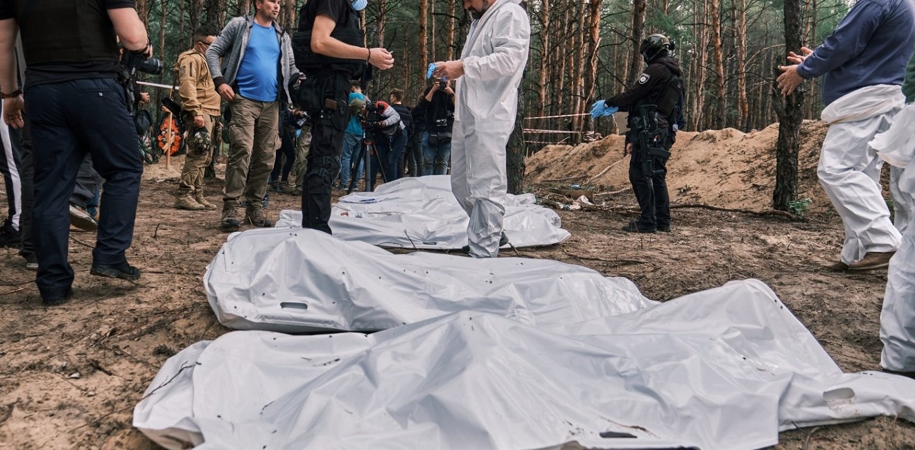 Izyum, Kharkiv Oblast, Ukraine. September 17, 2022. Exhumation of 450 bodies from a mass grave. Most of the victims were tortured and killed during Russian occupation.