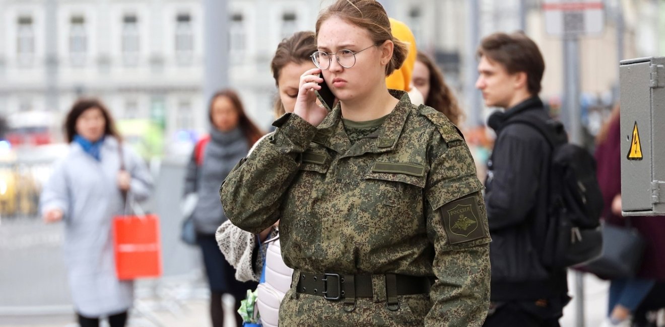 Russian Soldier talking on a phone