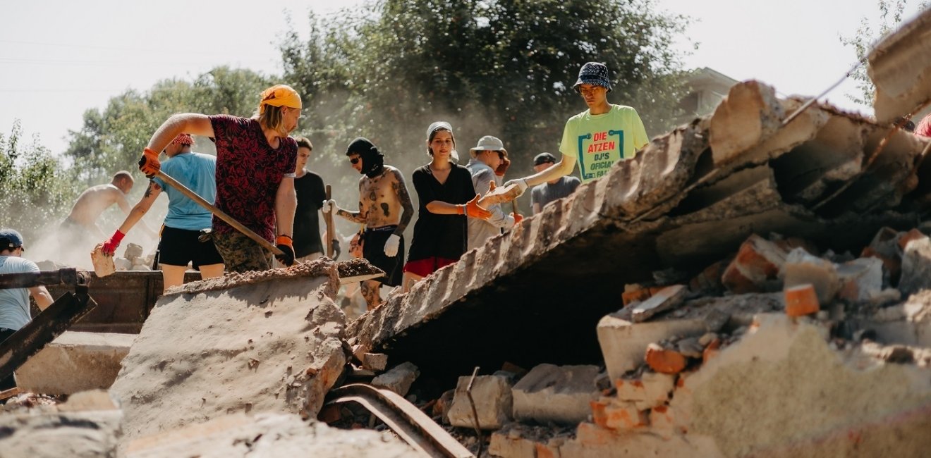 Group Cleaning up Rubble 