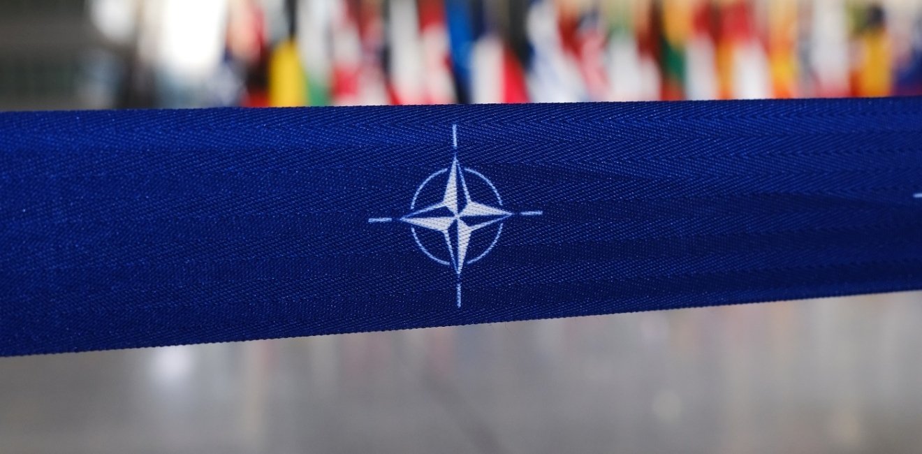 Nato logo on a banner