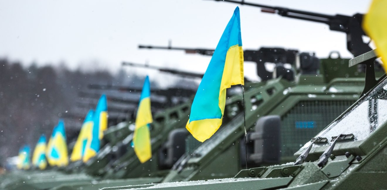 Military and armored vehicles at the International Center for Peacemaking and safety before transferring it into zone of military conflict