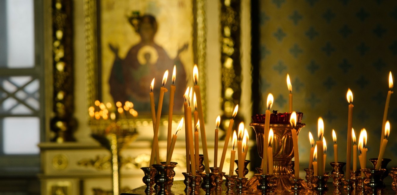 Candles are lit at an Orthodox Church