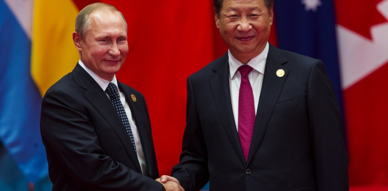 HANGZHOU, CHINA - SEPT. 4. 2016 - Chinese president Xi Jinping (R) welcomes Russian President Vladimir Putin (L) in G20 summit in Hangzhou.