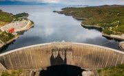 Concrete arch dam in the Kariba Gorge of the Zambezi river basin between Zambia and Zimbabwe. Dmitriy Kandinskiy/Shutterstock.